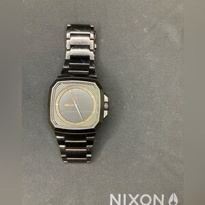 Nixon The Deck stainless steel watch.